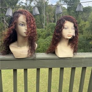 100% human hair 
All New and colored by me Auburn and Black Wig Set